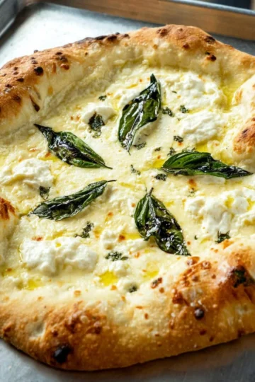 Delicious easy white pizza with creamy ricotta and mozzarella cheese