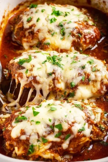 Baked French onion chicken topped with melted cheese and caramelized onions