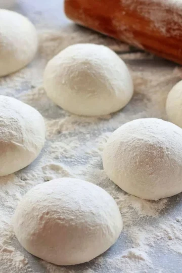 Homemade pizza crust recipe for delicious and crispy pizza.