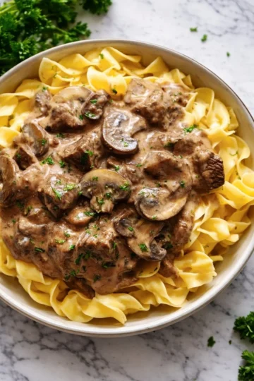 Delicious beef stroganoff prepared with tender beef and creamy sauce