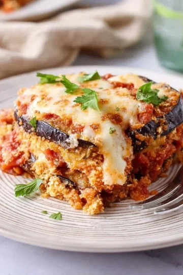 Delicious Baked Eggplant Parmesan with layers of cheese and marinara sauce
