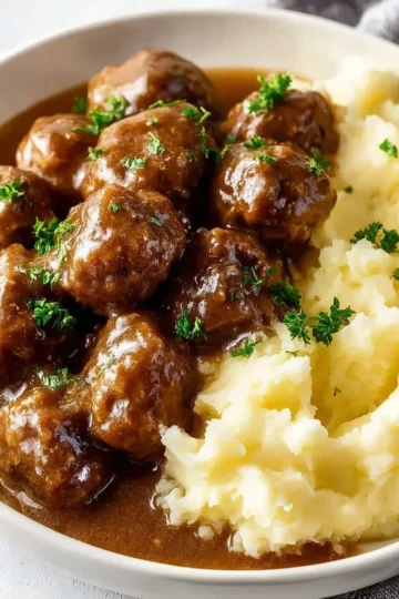 Delicious beef tips cooked in savory gravy served on a plate