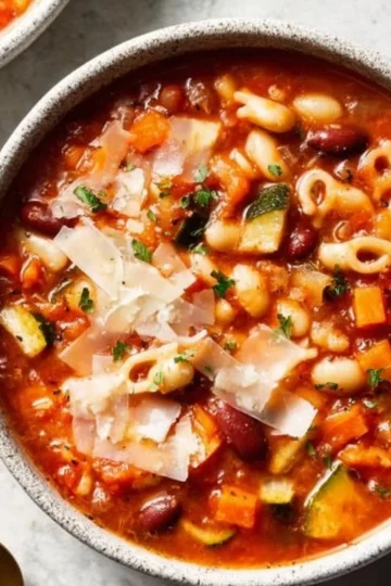 Bowl of Minestrone Soup filled with colorful vegetables and pasta