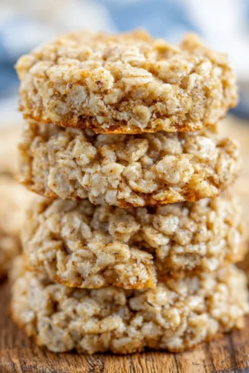 Freshly baked oatmeal cookies on a cooling rack