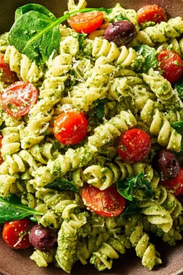 Pesto Pasta Salad with Spinach and Feta Cheese served in a bowl