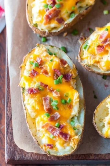 Delicious twice baked potatoes topped with cheese and herbs